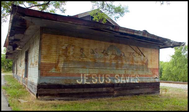 Crawfordville depot, mural on rear wall shows "Last Supper" with sign reading "Jesus Saves"