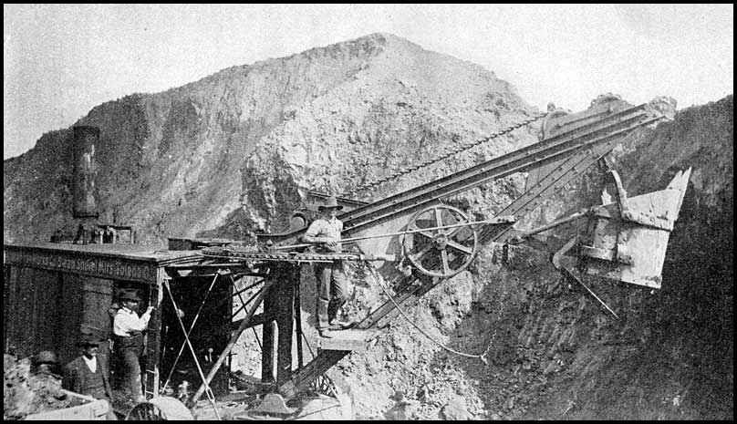 Steam shovel at mine near Ore Belt Railroad